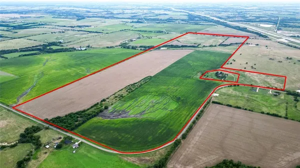 a view of a field with clear sky