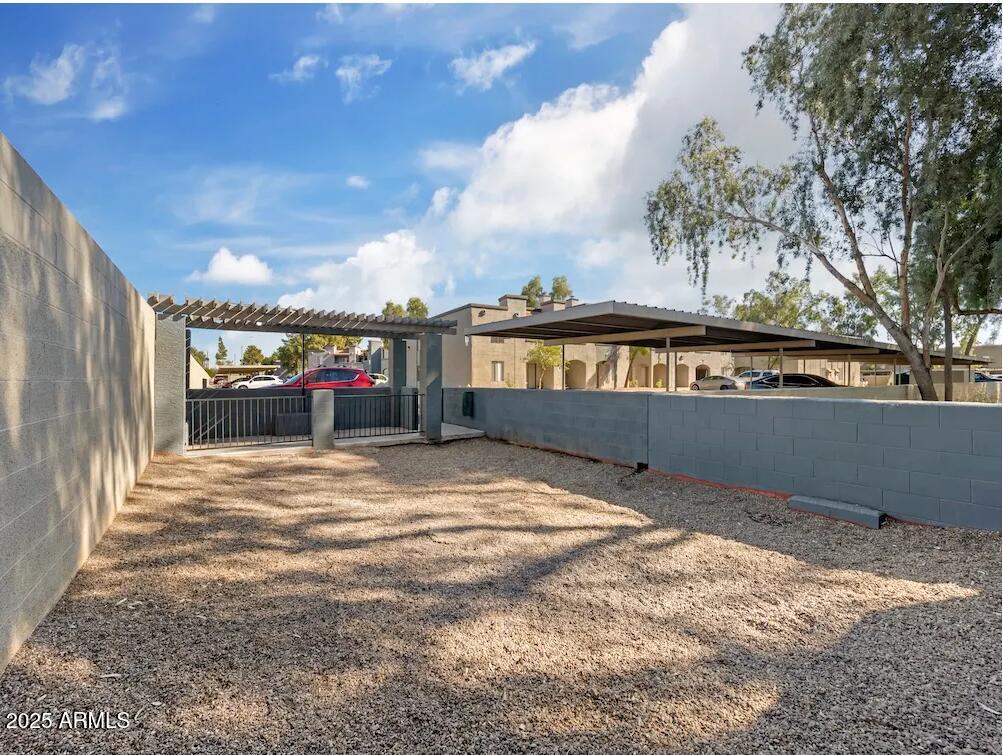 5750 North 59th Avenue, Unit 2 Glendale, AZ 85301 - Photo 11 of 12 a view of swimming pool with an outdoor seating