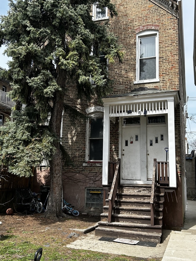 2744 West 23rd Street Chicago, IL 60608 - Photo 1 of 7 a front view of a house