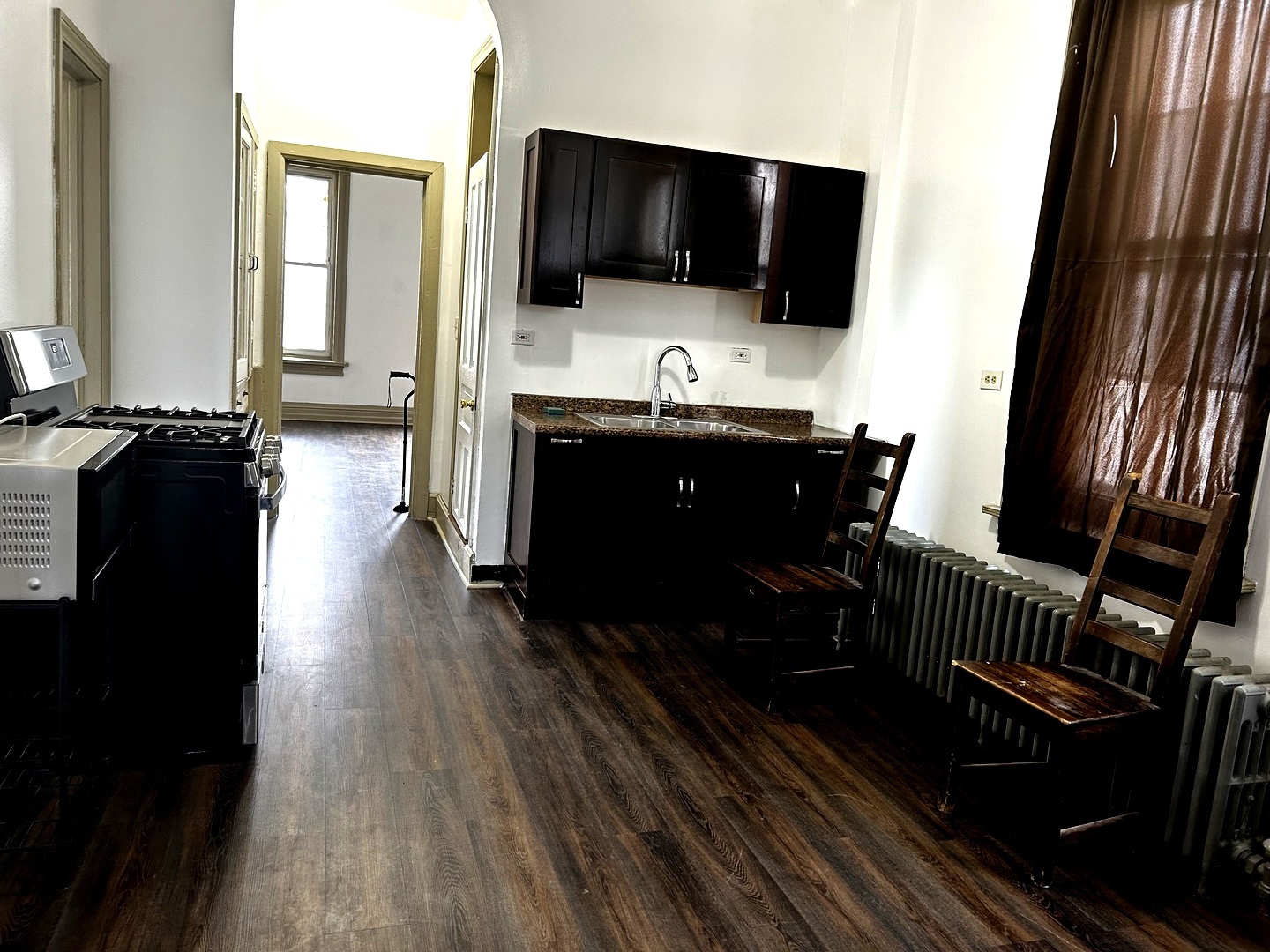 2744 West 23rd Street Chicago, IL 60608 - Photo 4 of 7 a view of a house and wooden floor