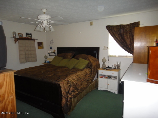 37216 Old Pineridge Road Hilliard, FL 32046 - Photo 7 of 13 Master bedroom