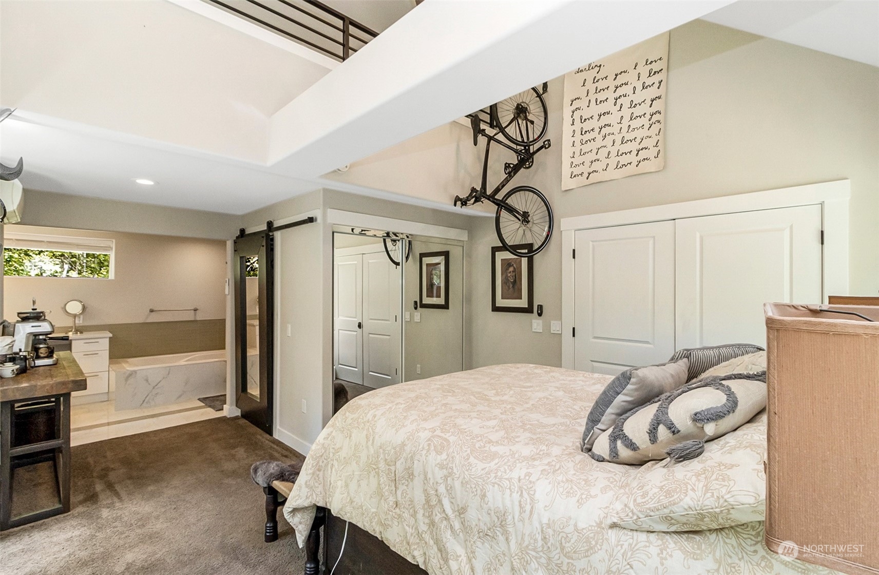 5124 Schwarzmiller Road Lake Stevens, WA 98258 - Photo 16 of 32 a bedroom with a bed and a table in it