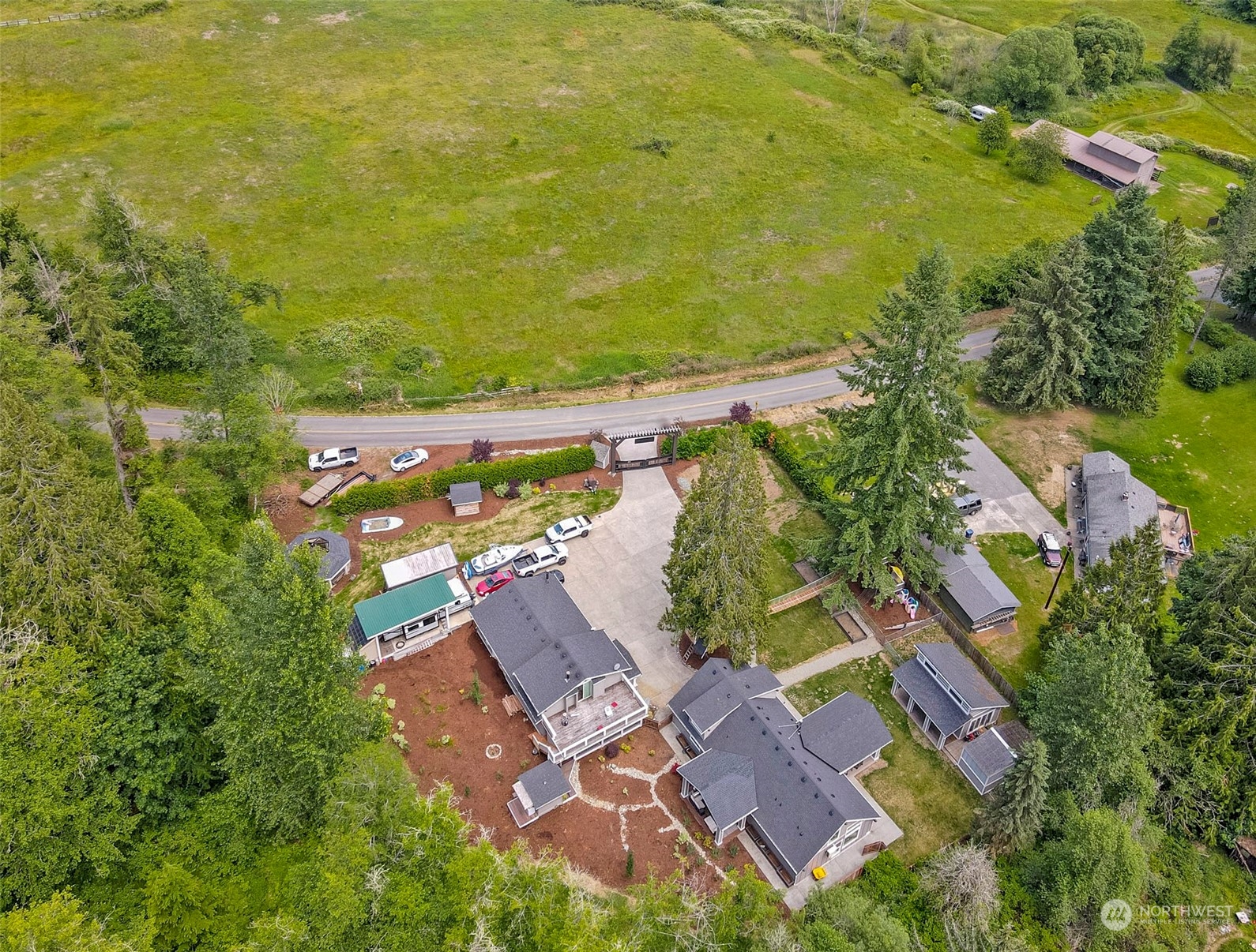 5124 Schwarzmiller Road Lake Stevens, WA 98258 - Photo 2 of 32 an aerial view of residential house with outdoor space and swimming pool