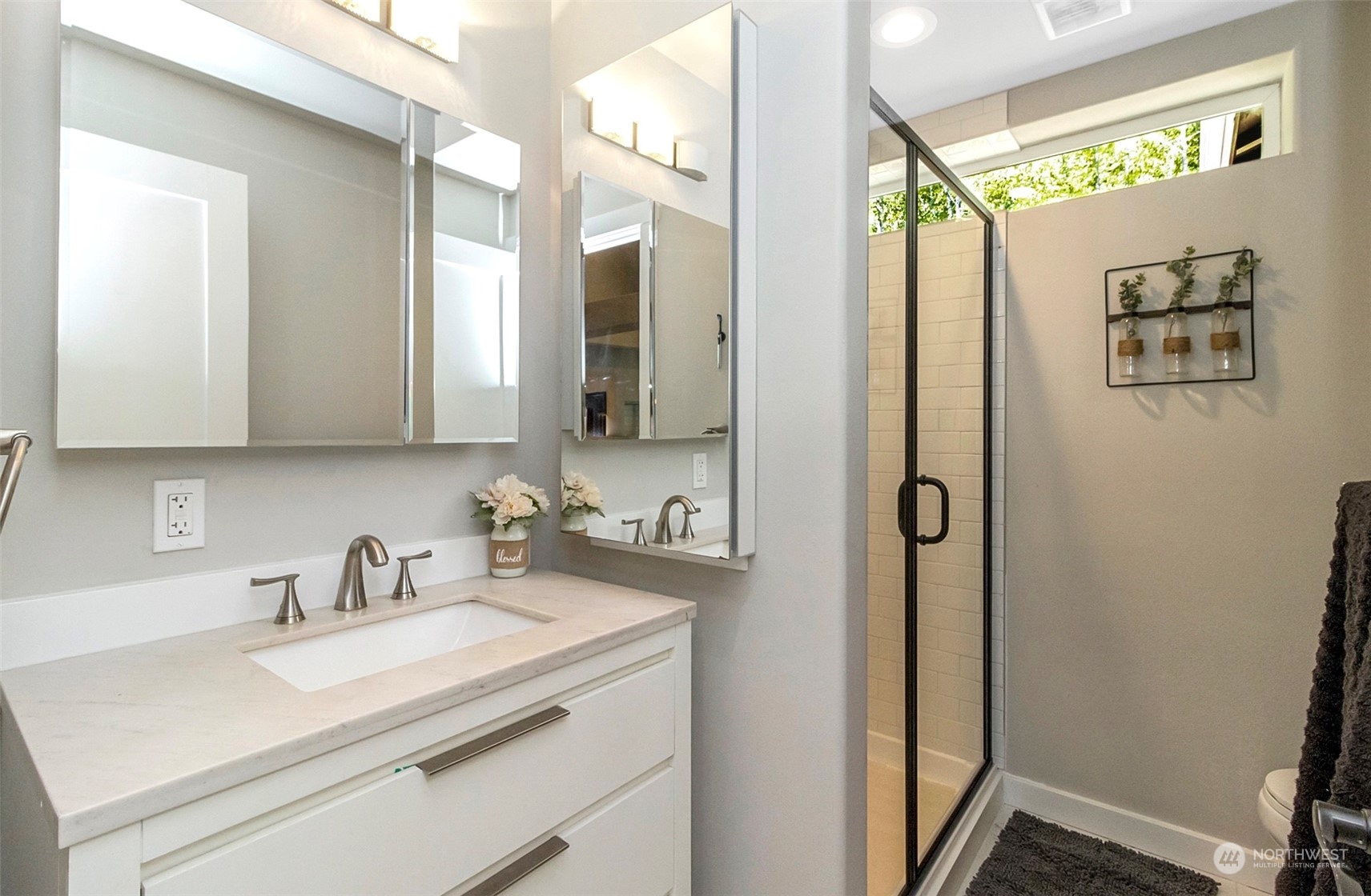 5124 Schwarzmiller Road Lake Stevens, WA 98258 - Photo 21 of 32 a bathroom with a sink and a mirror