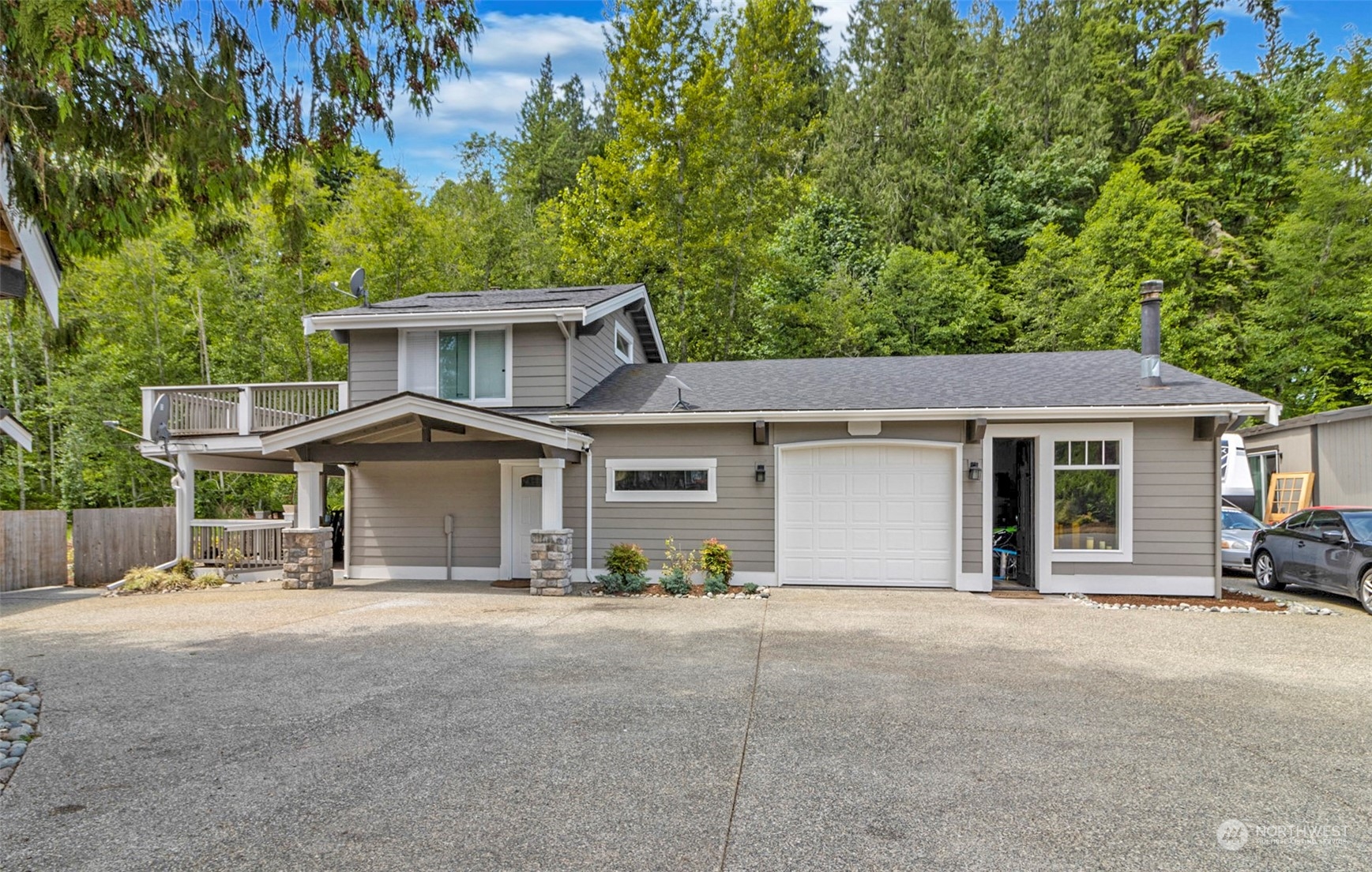 5124 Schwarzmiller Road Lake Stevens, WA 98258 - Photo 25 of 32 a view of a house with a outdoor space
