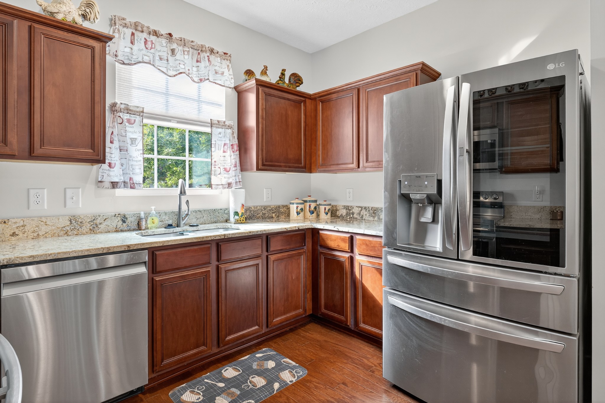 1309 Crown Point Place Nashville, TN 37211 - Photo 12 of 42 a kitchen with granite countertop stainless steel appliances and sink