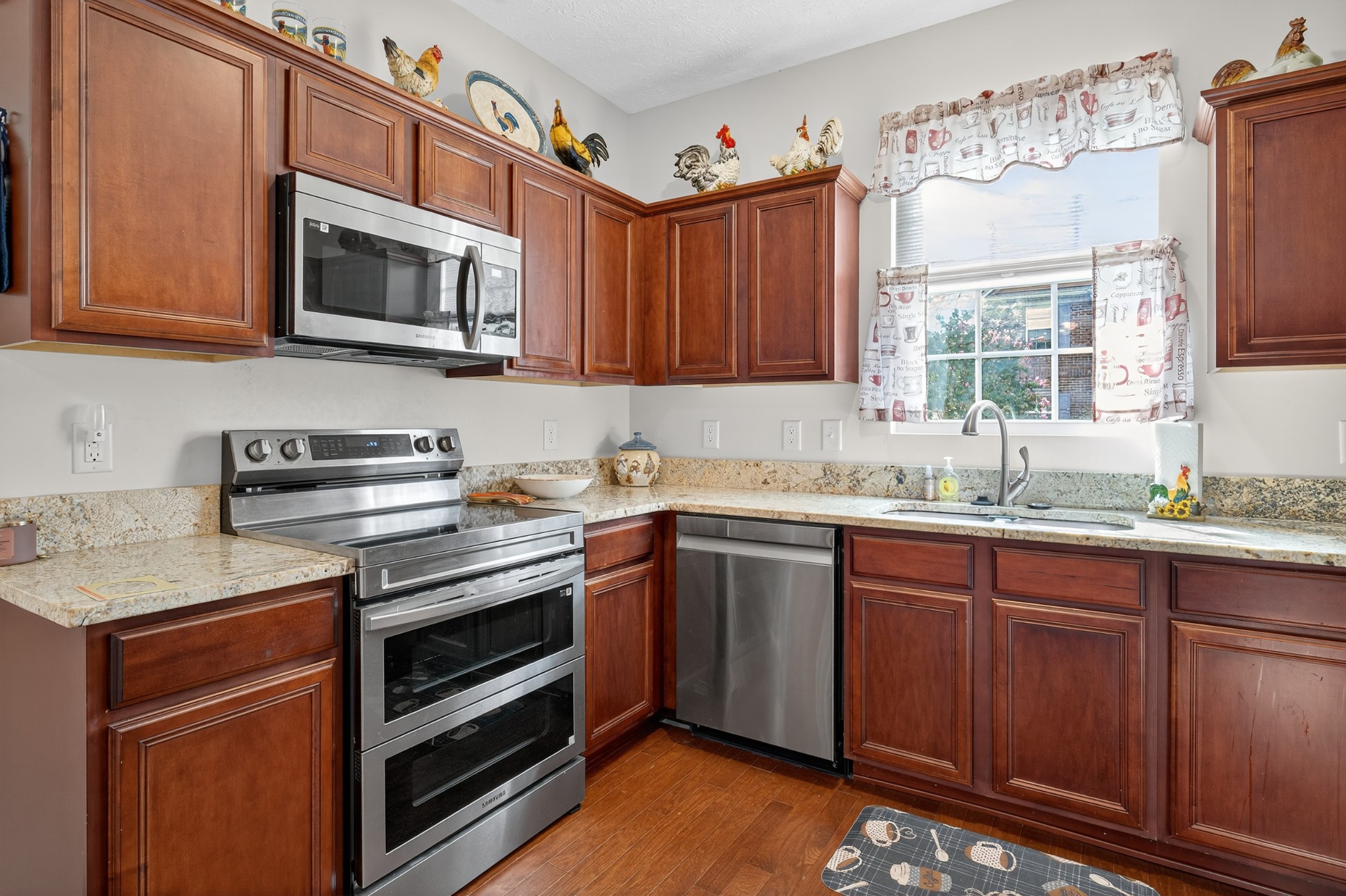 1309 Crown Point Place Nashville, TN 37211 - Photo 13 of 42 a kitchen that has a sink and a stove top oven