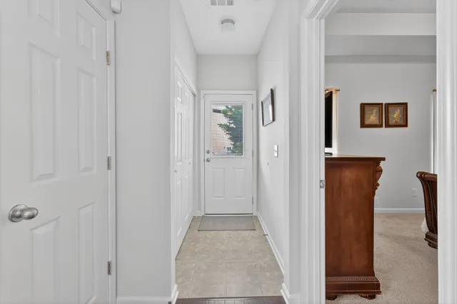wooden floor with a bathroom