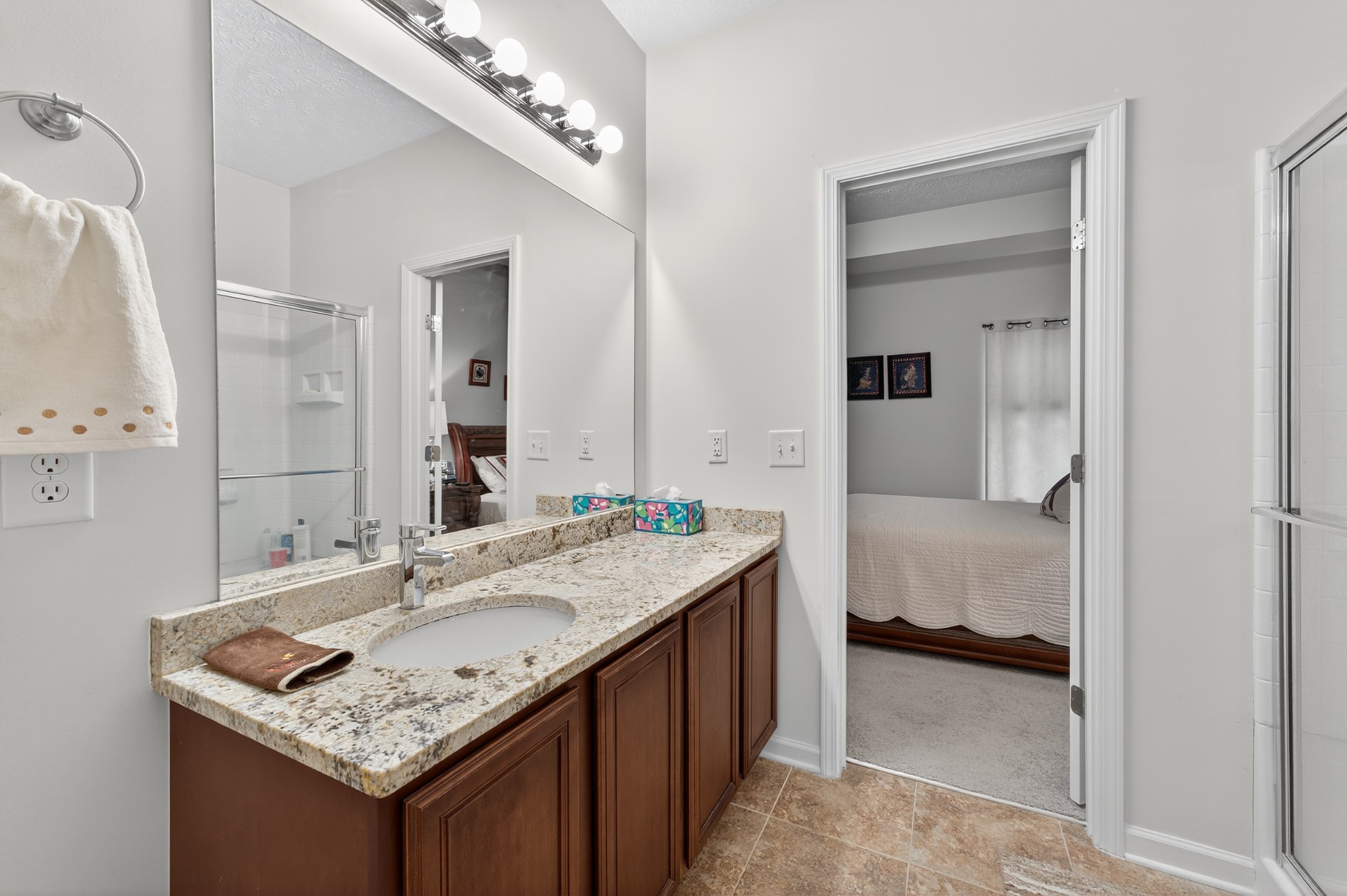 1309 Crown Point Place Nashville, TN 37211 - Photo 20 of 42 a en suite bathroom with a granite countertop sink and a mirror