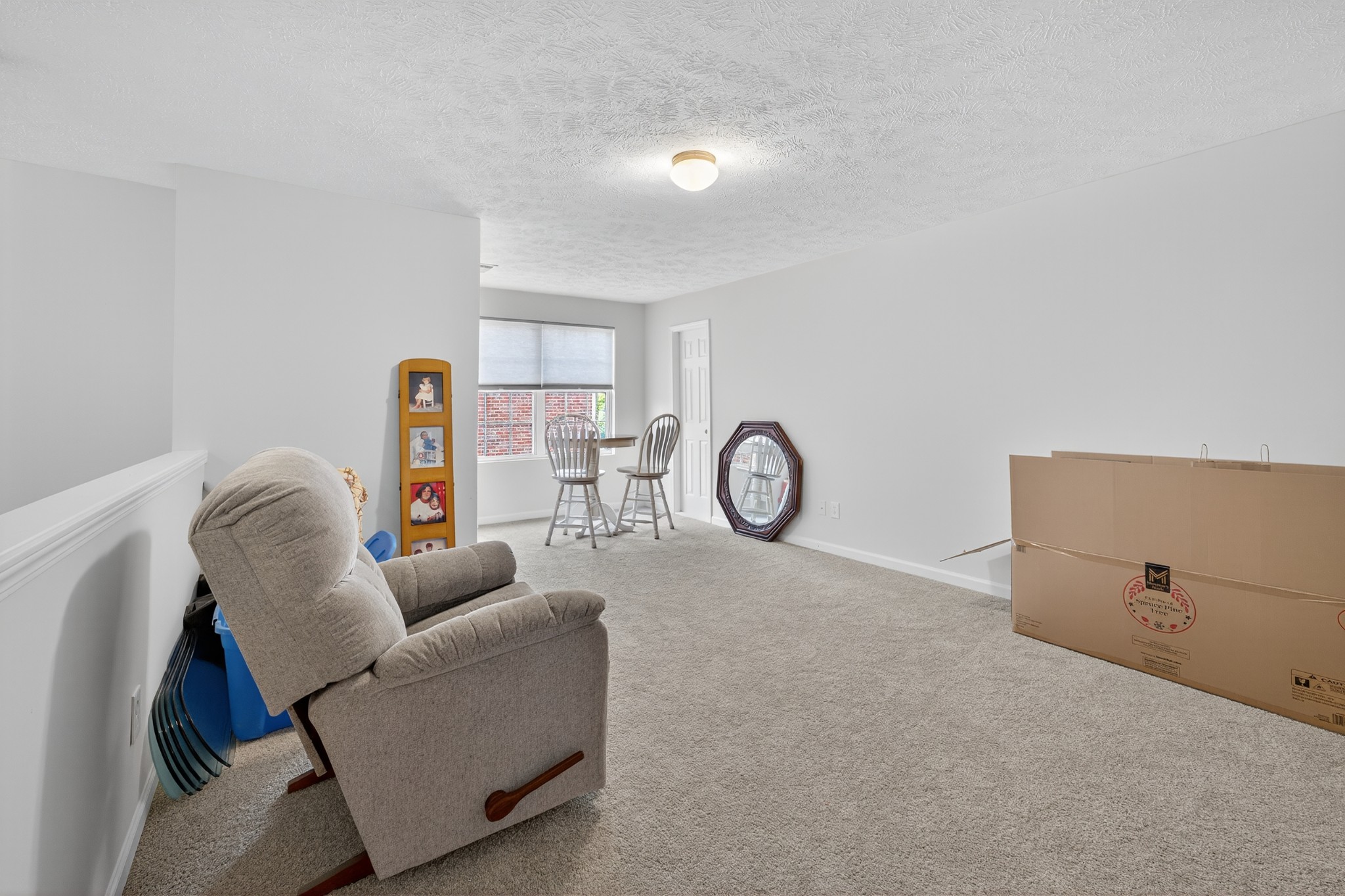 1309 Crown Point Place Nashville, TN 37211 - Photo 26 of 42 a living room with furniture and a window