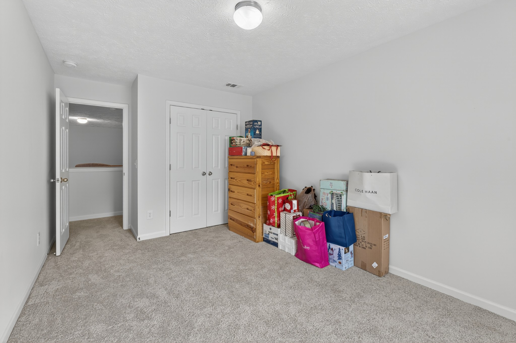 1309 Crown Point Place Nashville, TN 37211 - Photo 28 of 42 a bedroom with bed and closet