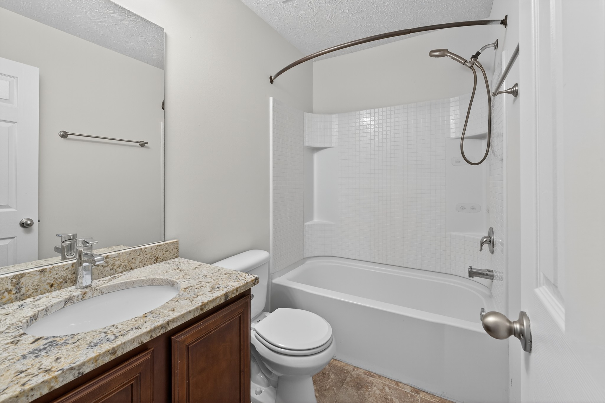 1309 Crown Point Place Nashville, TN 37211 - Photo 33 of 42 a bathroom with a granite countertop sink toilet and shower