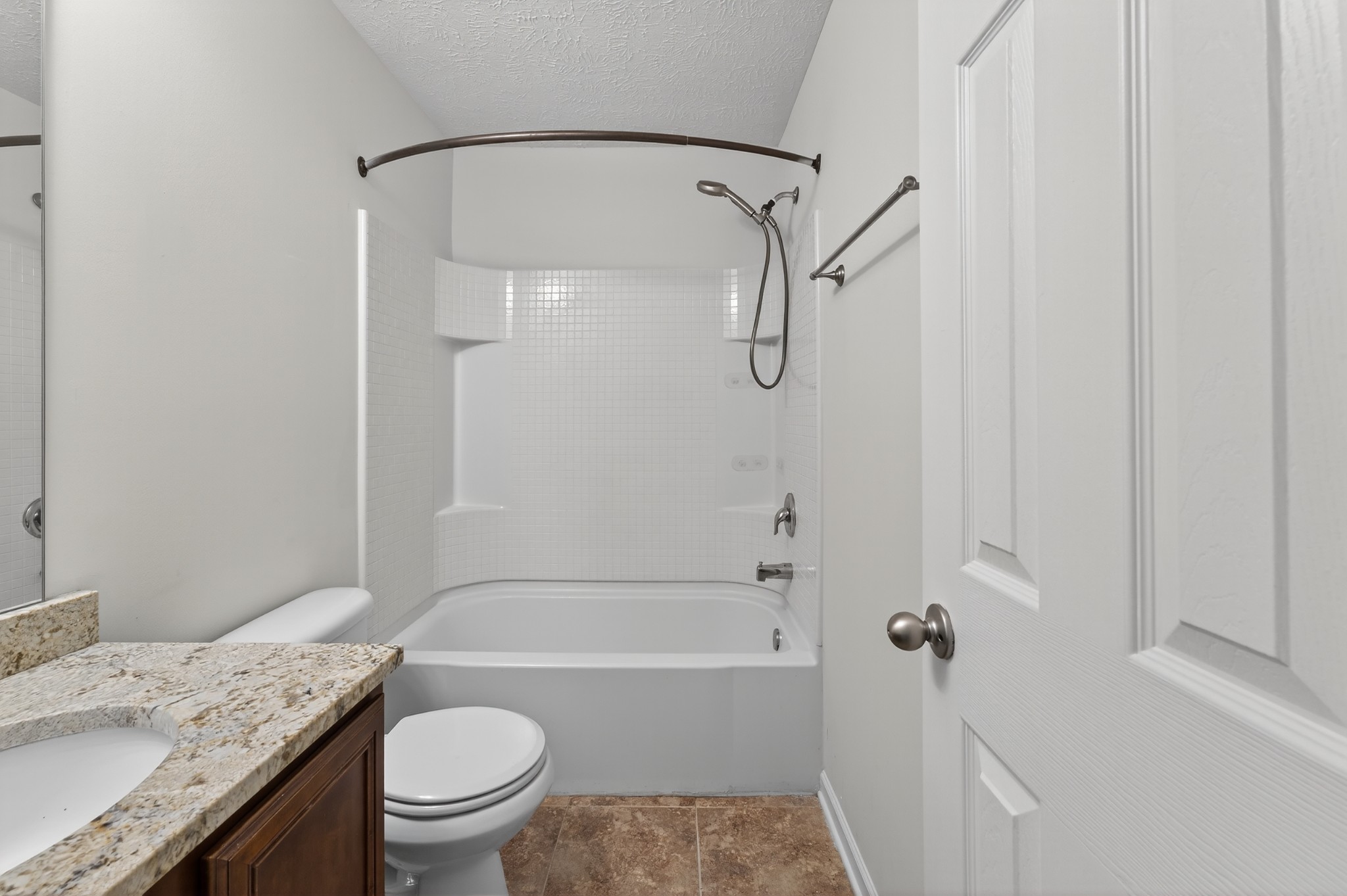 1309 Crown Point Place Nashville, TN 37211 - Photo 34 of 42 a bathroom with a granite countertop sink toilet and shower