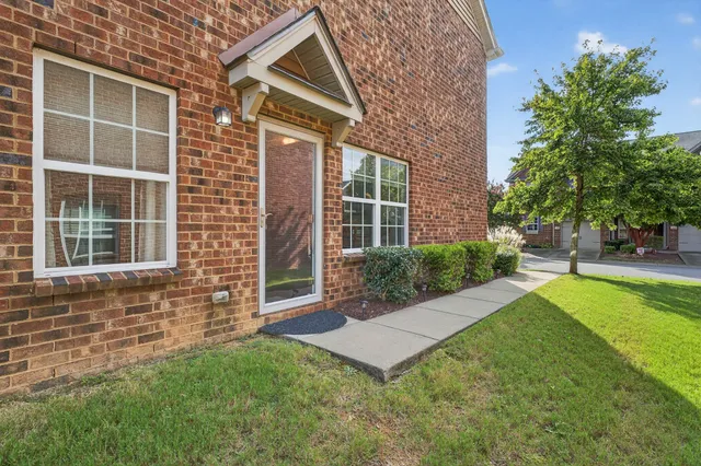 a view of outdoor space yard and front view of a house