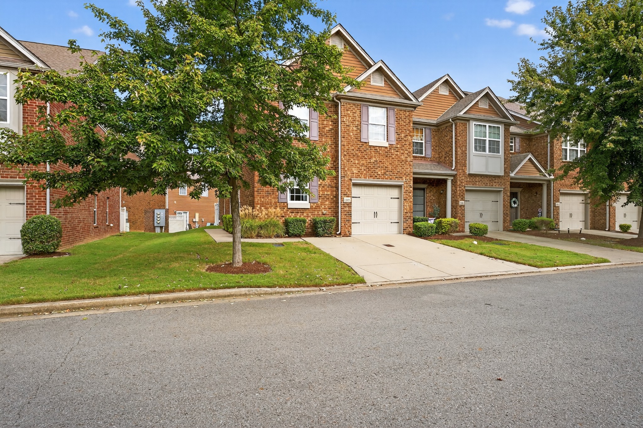 1309 Crown Point Place Nashville, TN 37211 - Photo 42 of 42 a view of a big house with a big yard and large trees