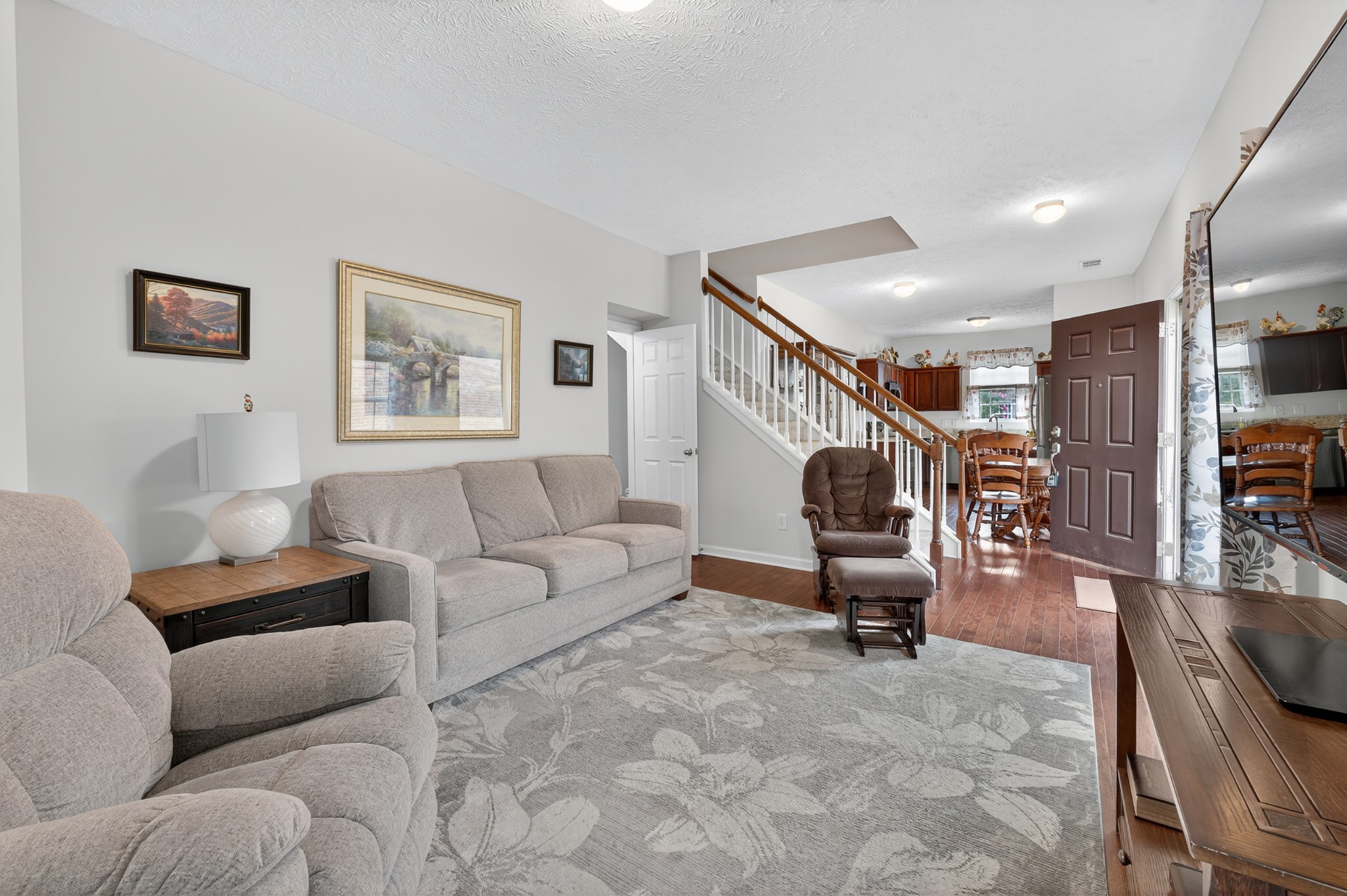 1309 Crown Point Place Nashville, TN 37211 - Photo 5 of 42 a living room with furniture and a wooden floor