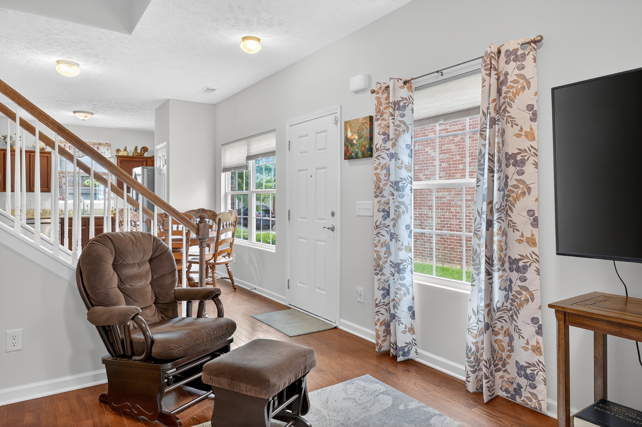 1309 Crown Point Place Nashville, TN 37211 - Photo 7 of 42 a living room with furniture and a flat screen tv