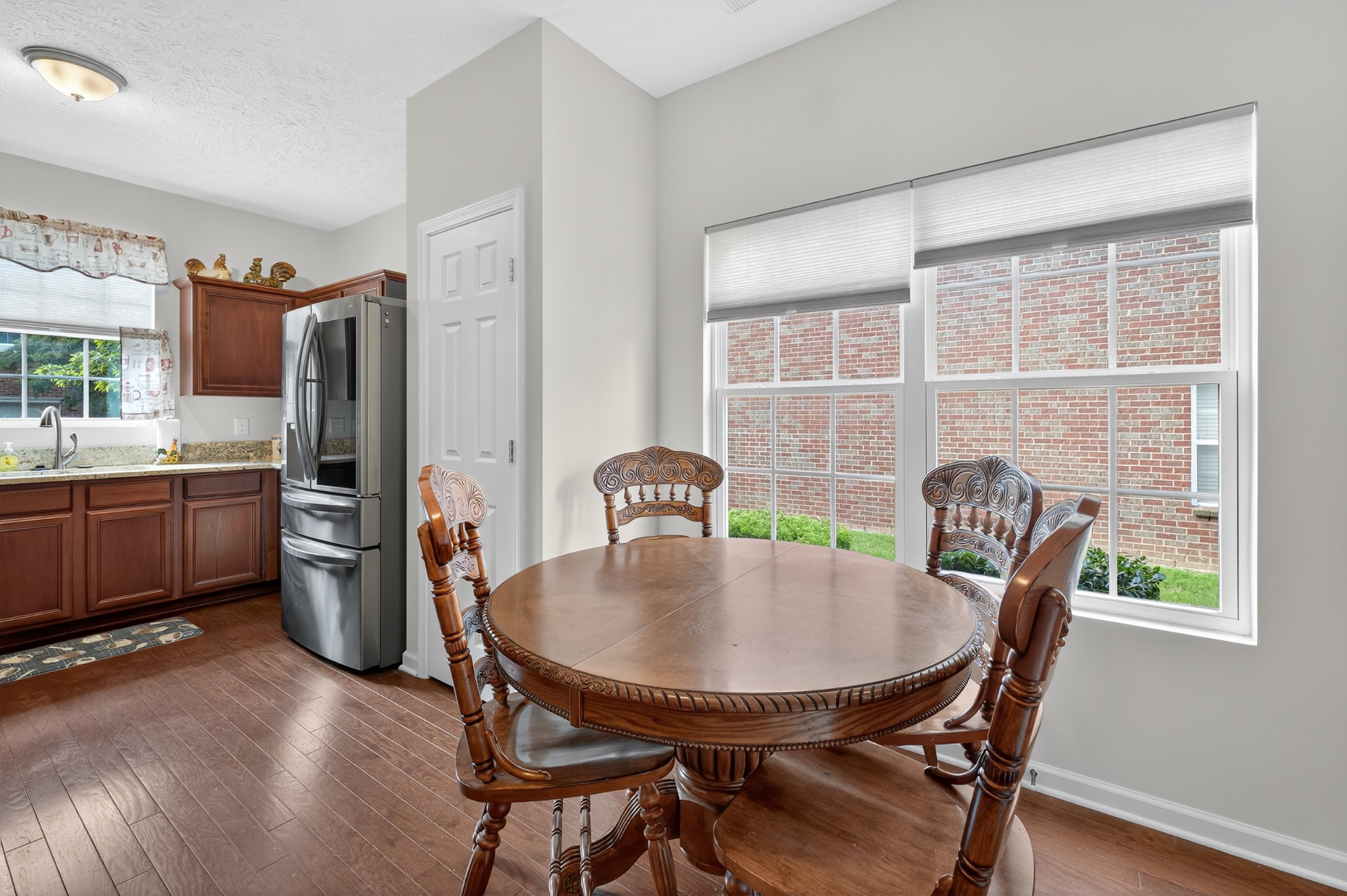 1309 Crown Point Place Nashville, TN 37211 - Photo 10 of 42 a kitchen with a table chairs stove and refrigerator