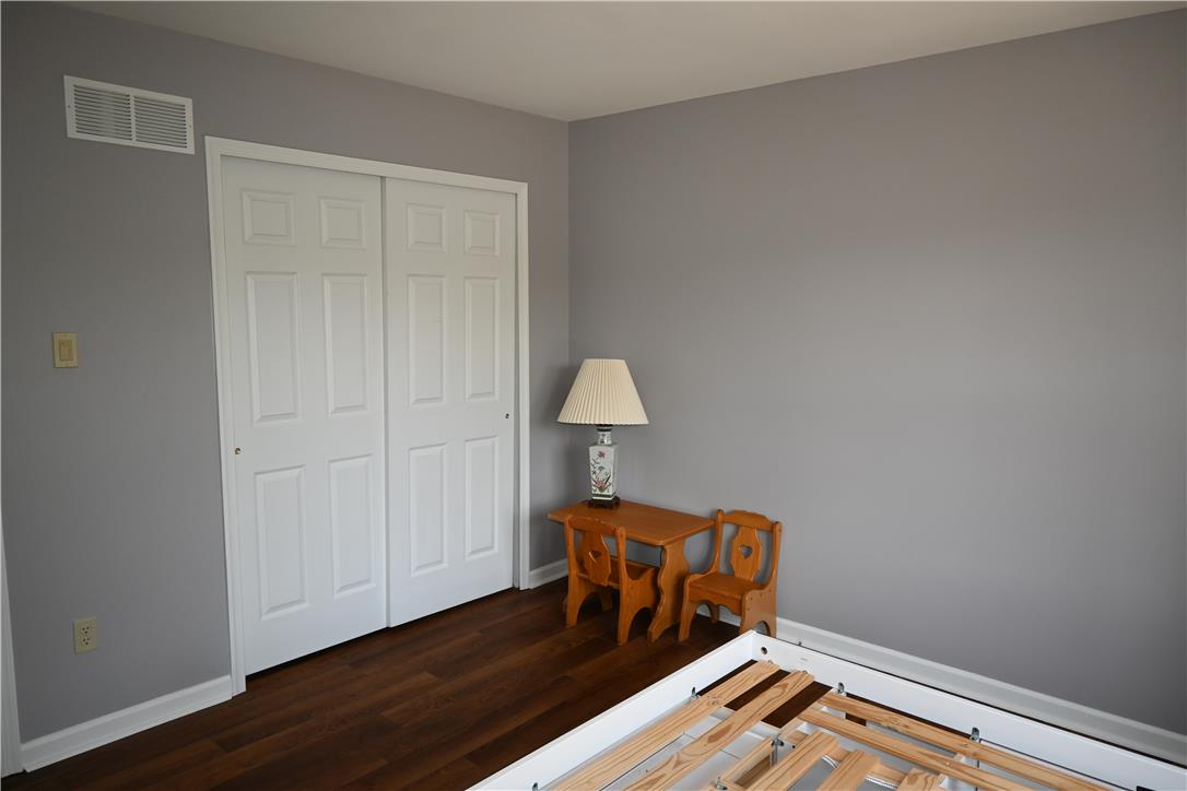 3829 East Hopewell Road Center Valley, PA 18034 - Photo 37 of 52 Wood flooring and closet space enhance this well-appointed bedroom.