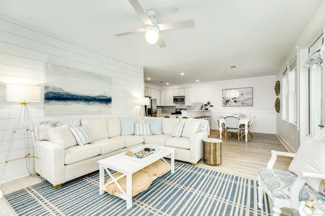 a bedroom with a bed and a television