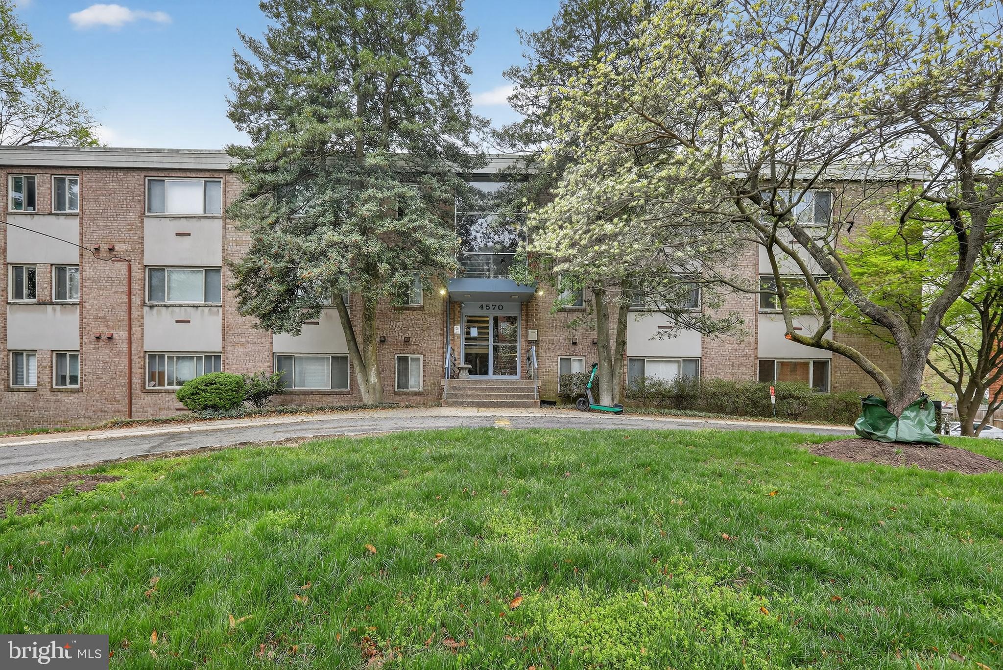 4570 MacArthur Boulevard Northwest, Unit 208 Washington, DC 20007 - Photo 1 of 17 front view of a house with a yard