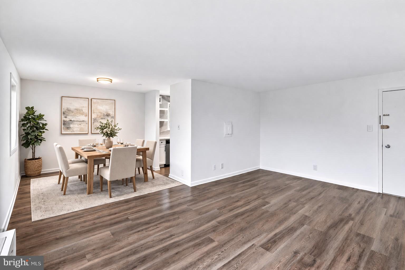 4570 MacArthur Boulevard Northwest, Unit 208 Washington, DC 20007 - Photo 4 of 17 a view of a dining room with furniture and wooden floor