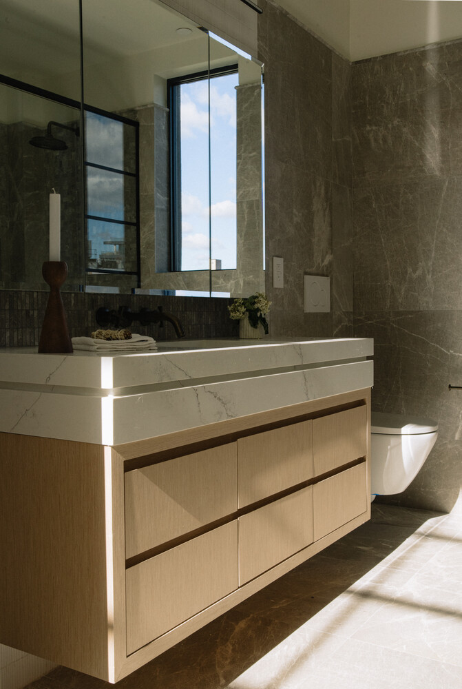402 Union Avenue, Unit PH2 Brooklyn, NY 11211 - Photo 16 of 23 a bathroom with a sink and a mirror