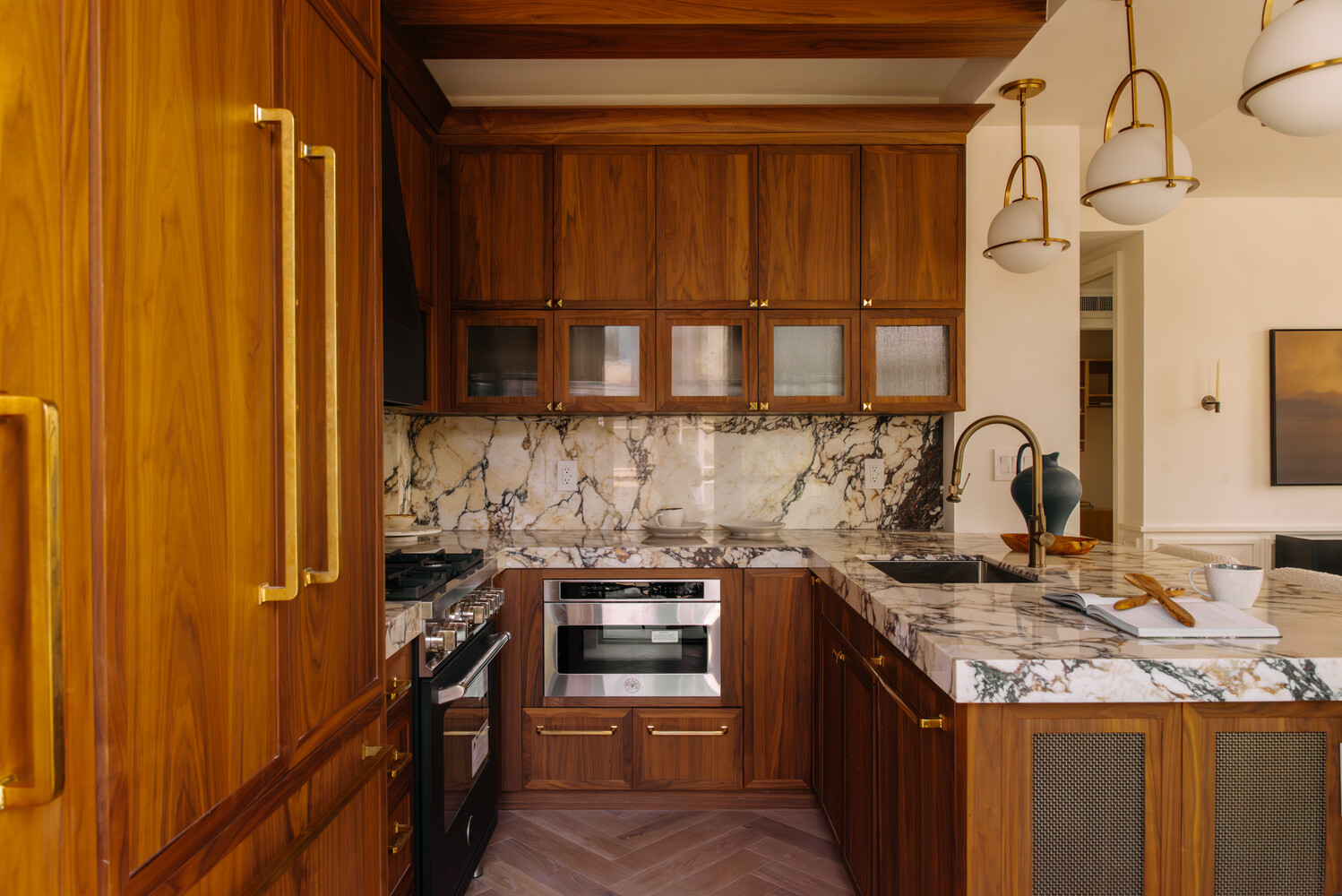 402 Union Avenue, Unit PH2 Brooklyn, NY 11211 - Photo 5 of 23 a kitchen with stainless steel appliances granite countertop a stove and a sink