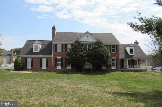 8401 Rocky Springs Road Frederick, MD 21702 - Photo 1 of 23 a view of a house with a garden