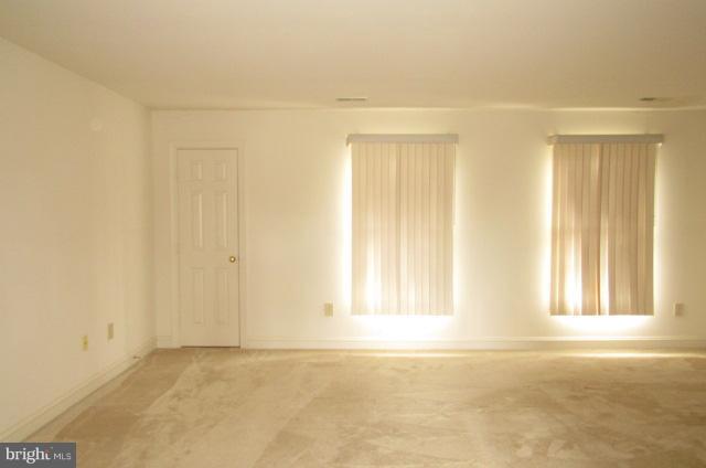 8401 Rocky Springs Road Frederick, MD 21702 - Photo 14 of 23 an empty room with windows