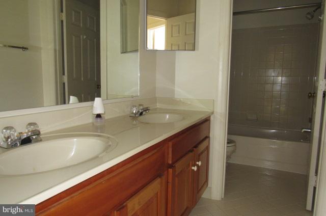 8401 Rocky Springs Road Frederick, MD 21702 - Photo 17 of 23 a bathroom with a tub sink and mirror