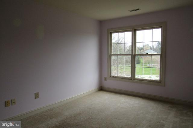 8401 Rocky Springs Road Frederick, MD 21702 - Photo 19 of 23 an empty room with a window