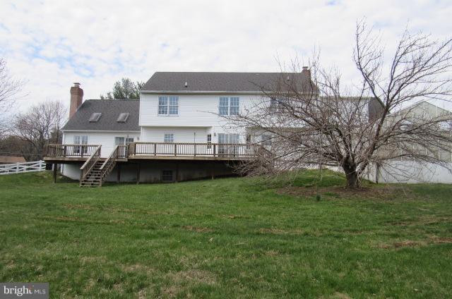 8401 Rocky Springs Road Frederick, MD 21702 - Photo 2 of 23 a view of a house with a backyard
