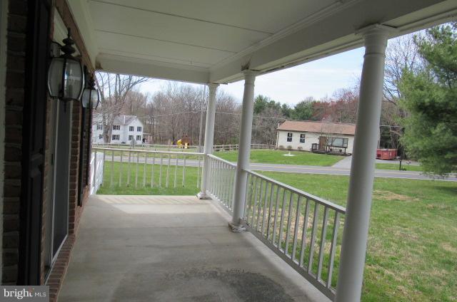 8401 Rocky Springs Road Frederick, MD 21702 - Photo 22 of 23 a view of a porch and garden