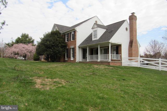 8401 Rocky Springs Road Frederick, MD 21702 - Photo 5 of 23 a view of a house with a backyard