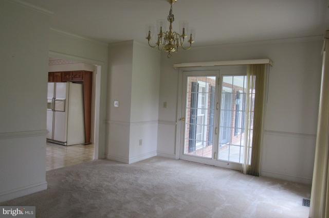 8401 Rocky Springs Road Frederick, MD 21702 - Photo 7 of 23 wooden floor and windows in an empty room
