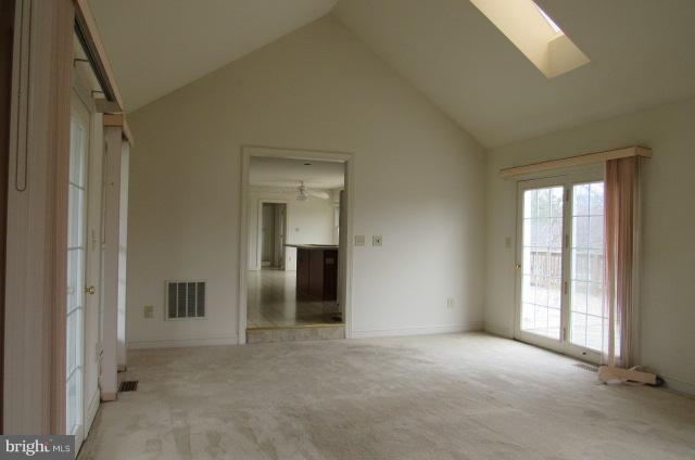 8401 Rocky Springs Road Frederick, MD 21702 - Photo 9 of 23 an empty room with windows and cabinet