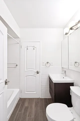 a kitchen that has a sink and a stove