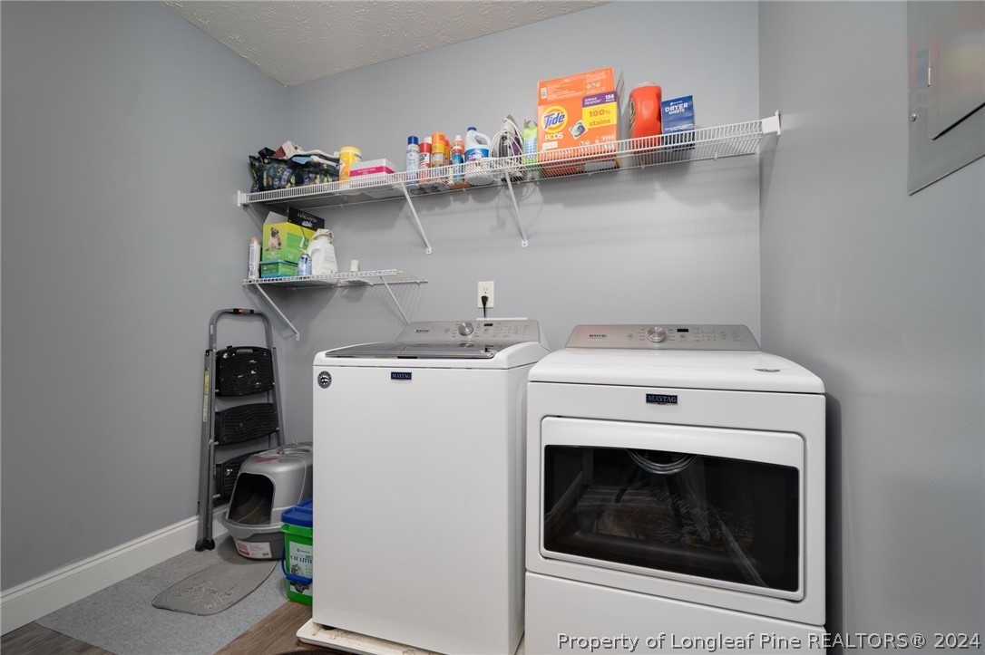 3590 Calloway Road Raeford, NC 28376 - Photo 22 of 44 a utility room with dryer and washer