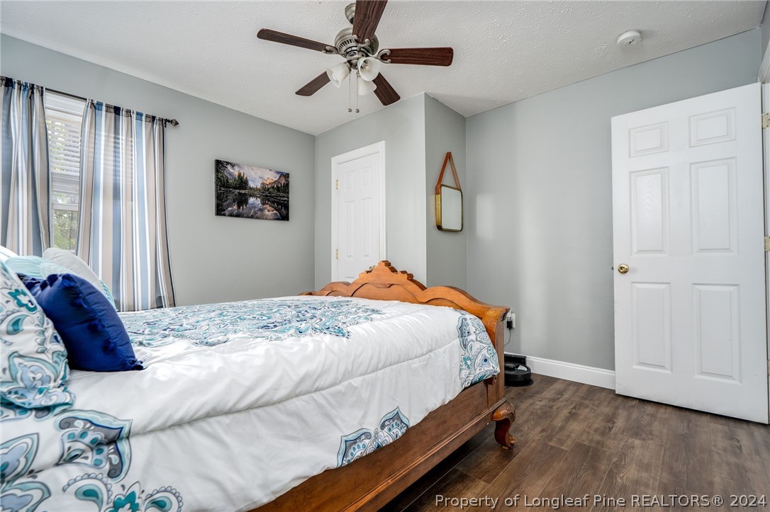 3590 Calloway Road Raeford, NC 28376 - Photo 27 of 44 a bedroom with a bed and a window
