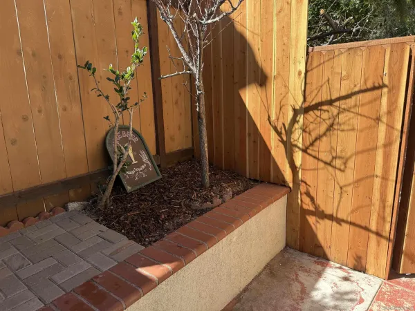 a bedroom with a bed and a television