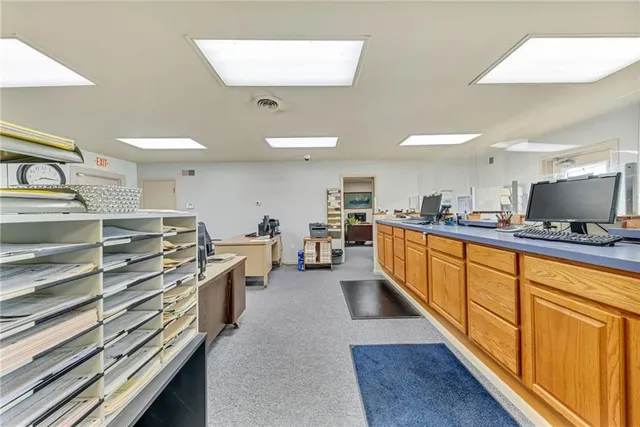 a view of a workspace with furniture and toys