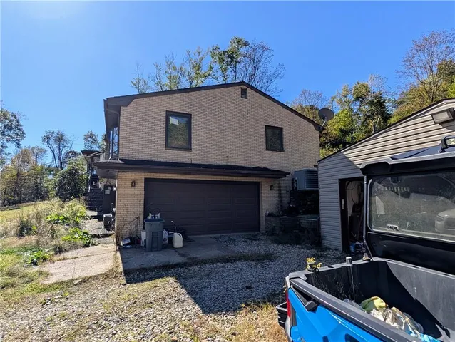 a house view with a outdoor space