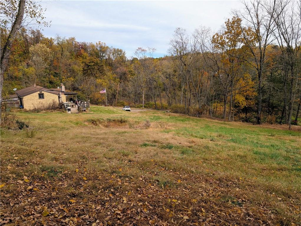 344 McKee Road North Versailles, PA 15137 - Photo 27 of 40 a view of a field with trees in the background