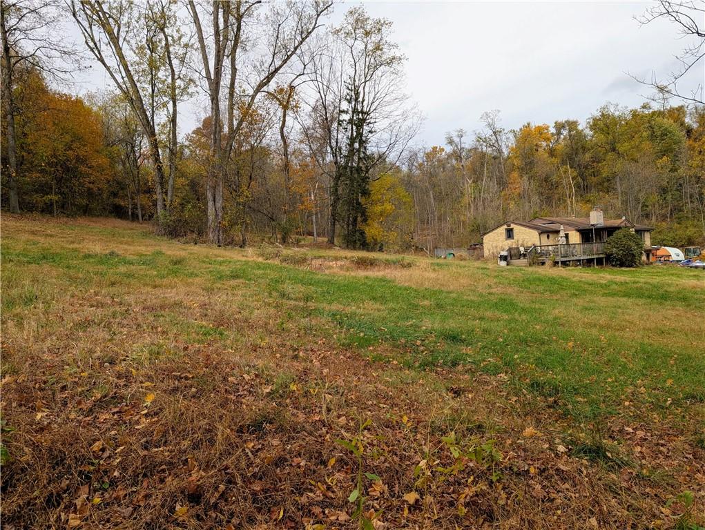 344 McKee Road North Versailles, PA 15137 - Photo 29 of 40 a view of a field with trees in the background