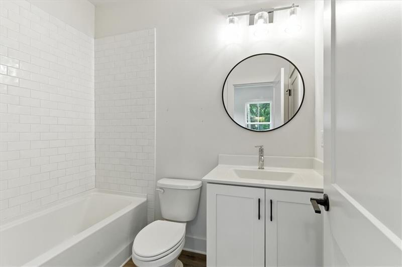 170 Color Circle Atlanta, GA 30317 - Photo 21 of 34 a bathroom with a sink and a mirror