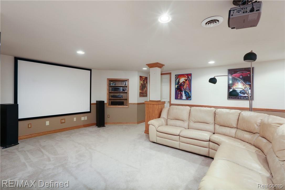 4140 Ridge Side Drive Rochester, MI 48306 - Photo 5 of 42 Spacious finished lower level with a spacious t.v. viewing area.