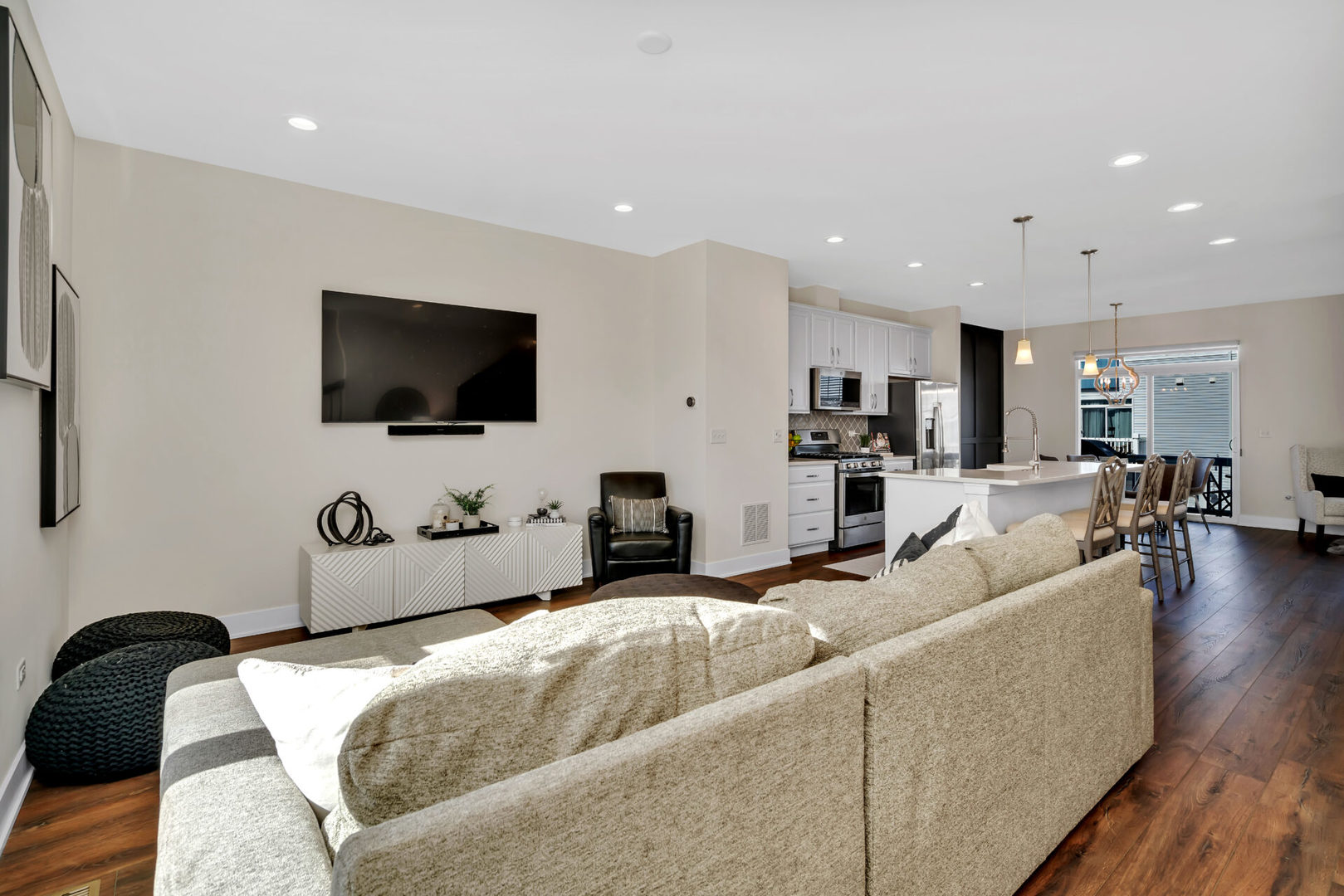 4133 Calder Lane Aurora, IL 60504 - Photo 20 of 31 a living room with furniture and a flat screen tv