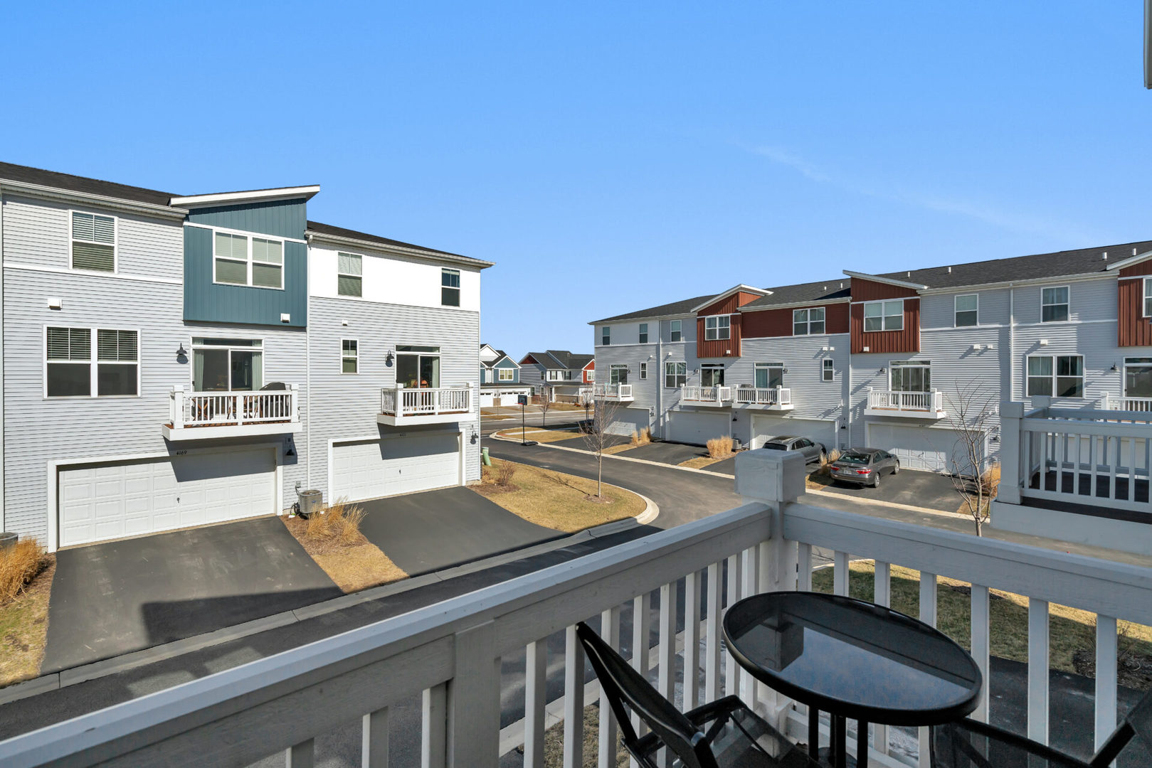 4133 Calder Lane Aurora, IL 60504 - Photo 28 of 31 a view of a balcony dining table and chairs