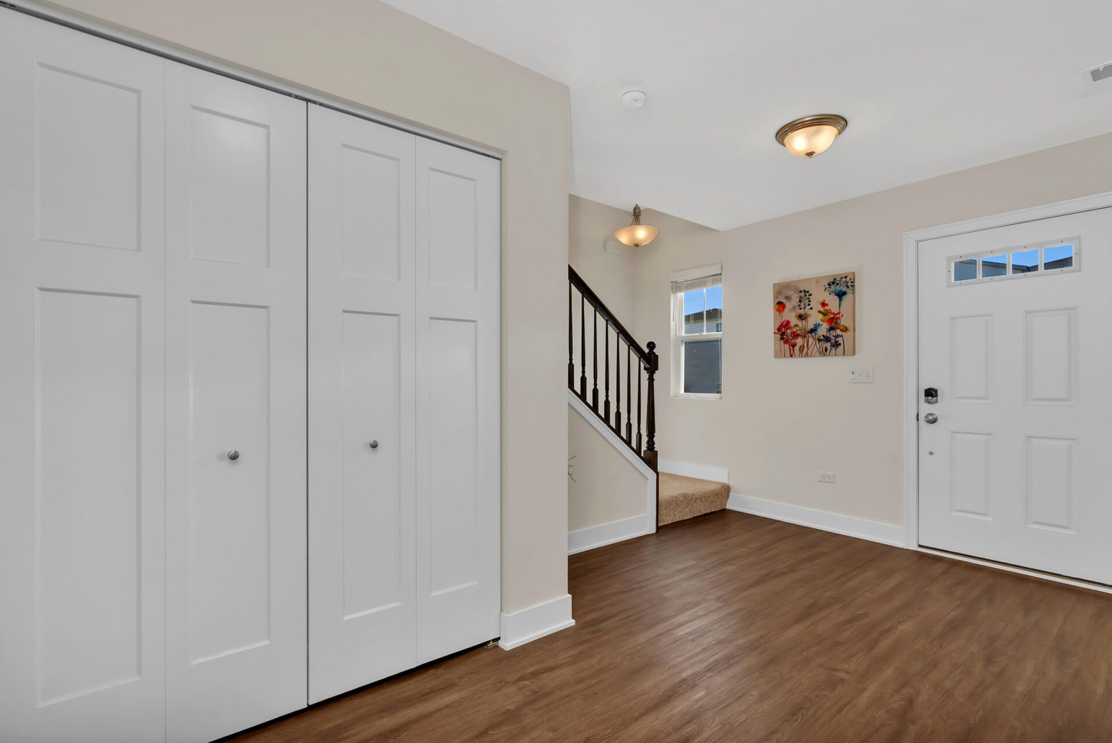 4133 Calder Lane Aurora, IL 60504 - Photo 3 of 31 a view of a hallway with wooden floor